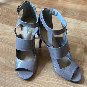 New Taupe open toe gladiator style  3 high heels man made material.